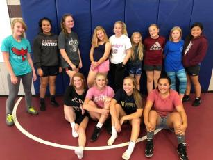 The new Swain High Lady Devils Wrestling team is pictured after their first official practice on Oct. 30. Some have competed on co-ed teams in the past and for others, the sport is new.