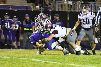 The 2019 Maroon Devils Varsity Football team had a good run this season, wrapping things up with a loss to 2nd seed Mitchell in the third round of playoffs. Above, Maroon Devils defense takes down a Mountaineer in the game that ended in a score of 38-6.