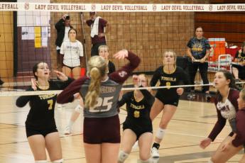 Addi Jenkins spikes the ball across the net when the JV team took on Tuscola.