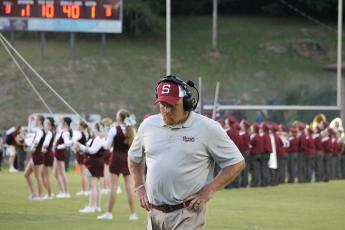 Maroon Devil Head Coach Sherman Holt looks tense during the tough game against Dade County.