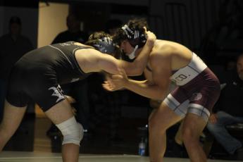Swain County High's Austin Jenkins goes up against Willie Riddle from Robbinsville, with Riddle coming out on top in the end.