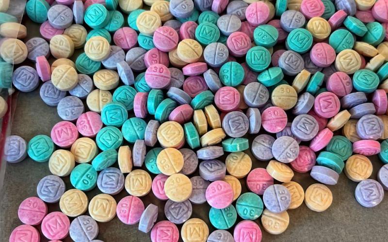 This image from the U.S. Drug Enforcement Agency show rainbow fentanyl that's been pressed into multi-colored pills.