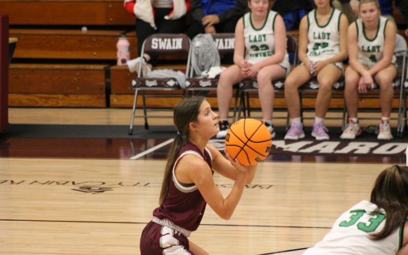 Senior Amaya Hicks takes a foul shot at the game against North Stokes during Swain’s Christmas tournament last week.