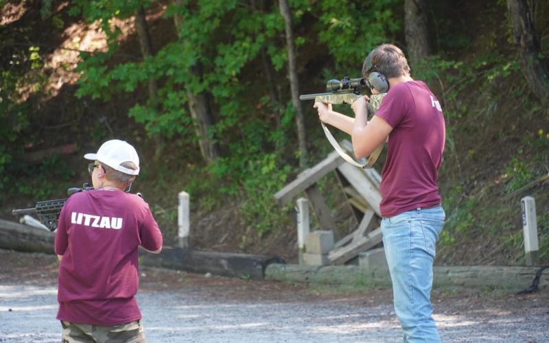 Swain competes in shooting