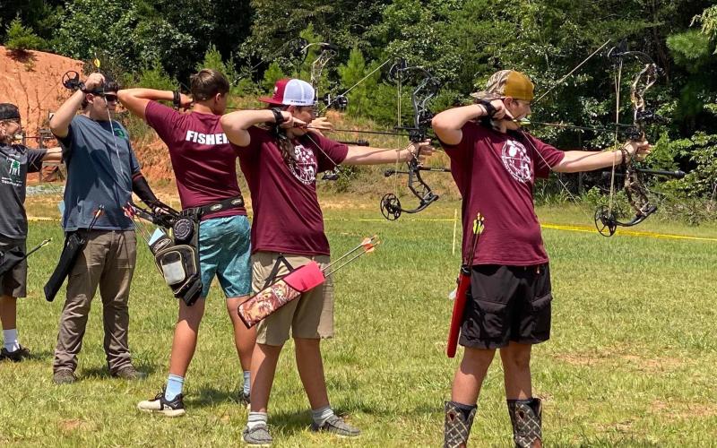 Swain competes in archery