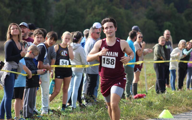Connor Lambert crosses the finish line at the Kituwah meet for the Smoky Mountain Conference on Saturday, Oct. 14.