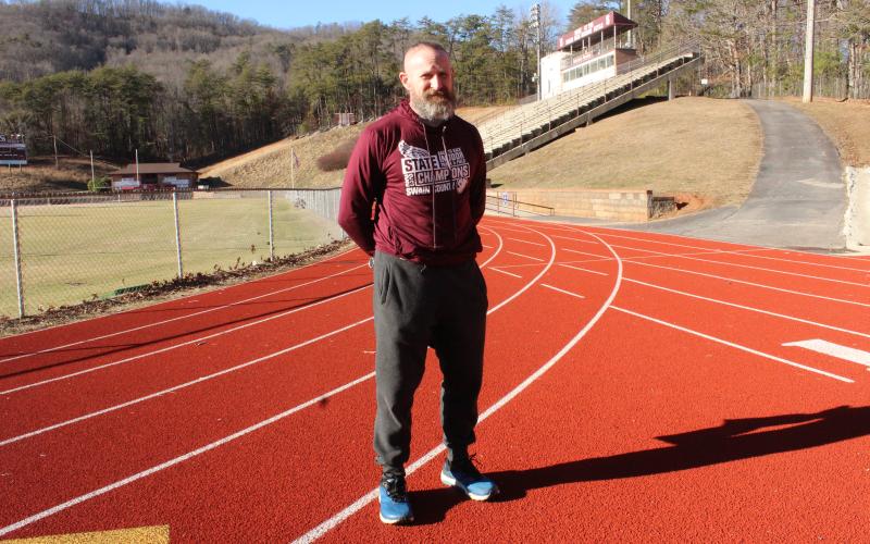 Coach Keith Payne has only celebrated his recent Cross Country Coach of the Year award by continuing to coach his students.